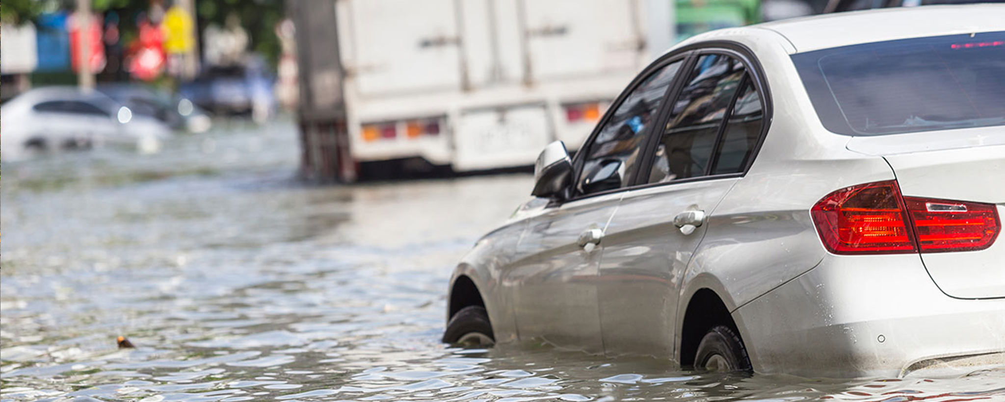 Cars floating in flood water