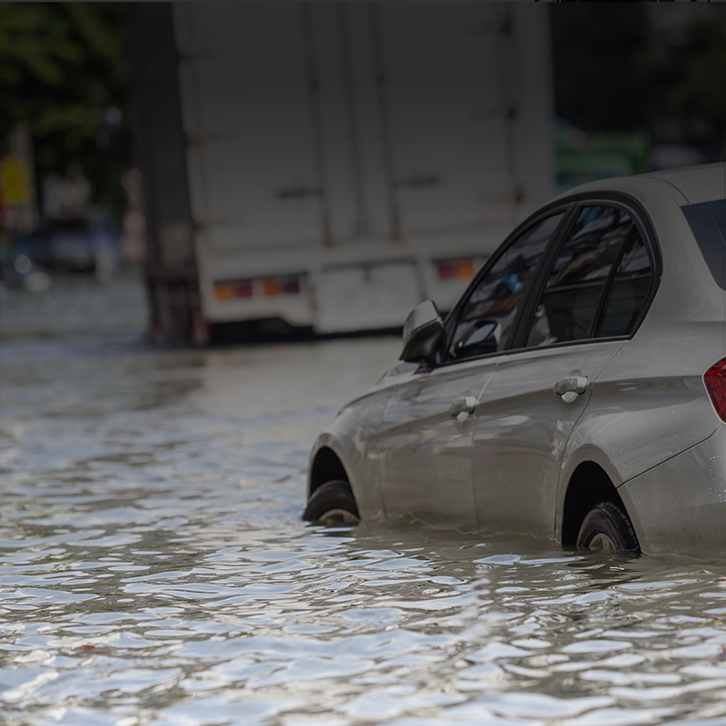 A car floating in several feet of water.