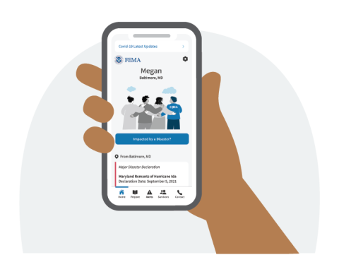 a hand holding a smart phone open to the FEMA App