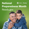 A son hugs his father from behind. National Preparedness Month. 